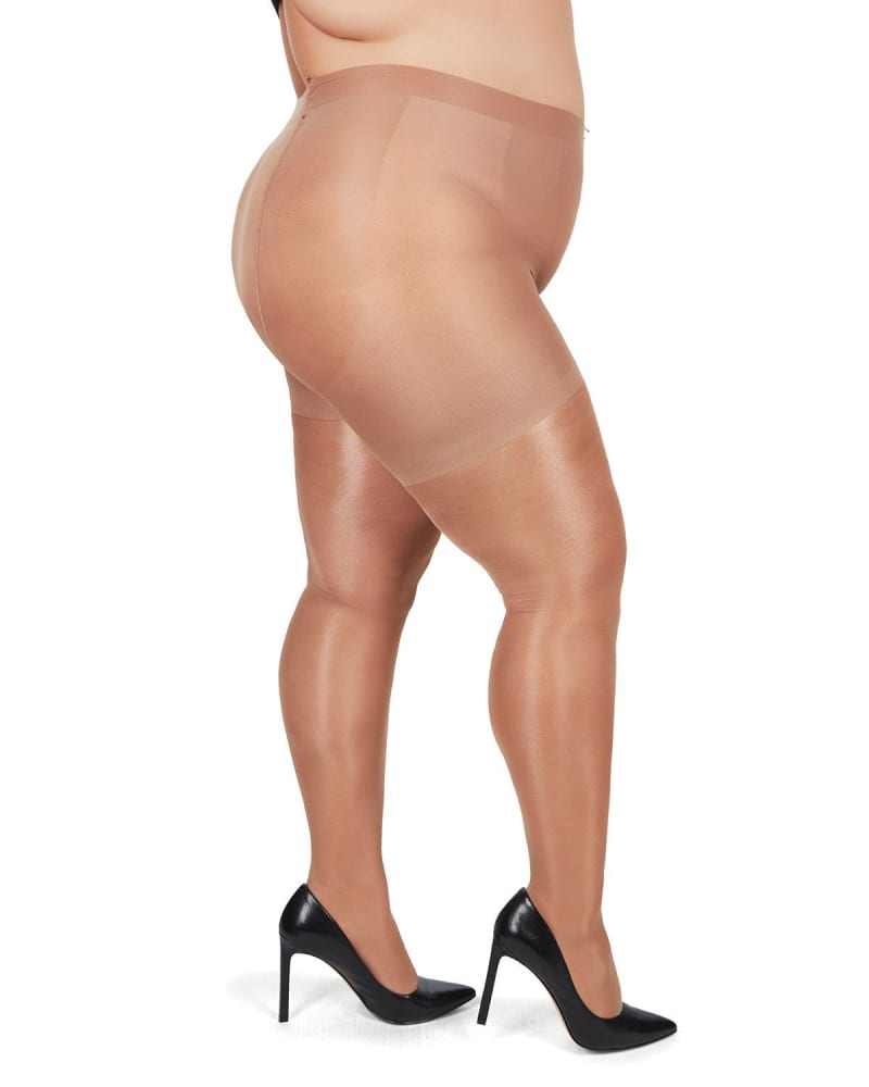 Side of a model wearing a size Q1-2 BodySmootHers Luster Shaper Tights in Honey by Memoi. | dia_product_style_image_id:299571